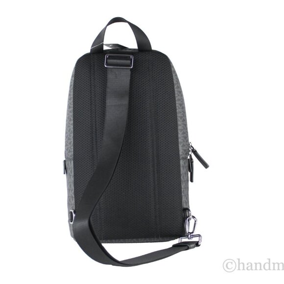 NWT Michael Kors Cooper Medium Commuter Slingpack Black Signature PVC Book Bag - Picture 2 of 6